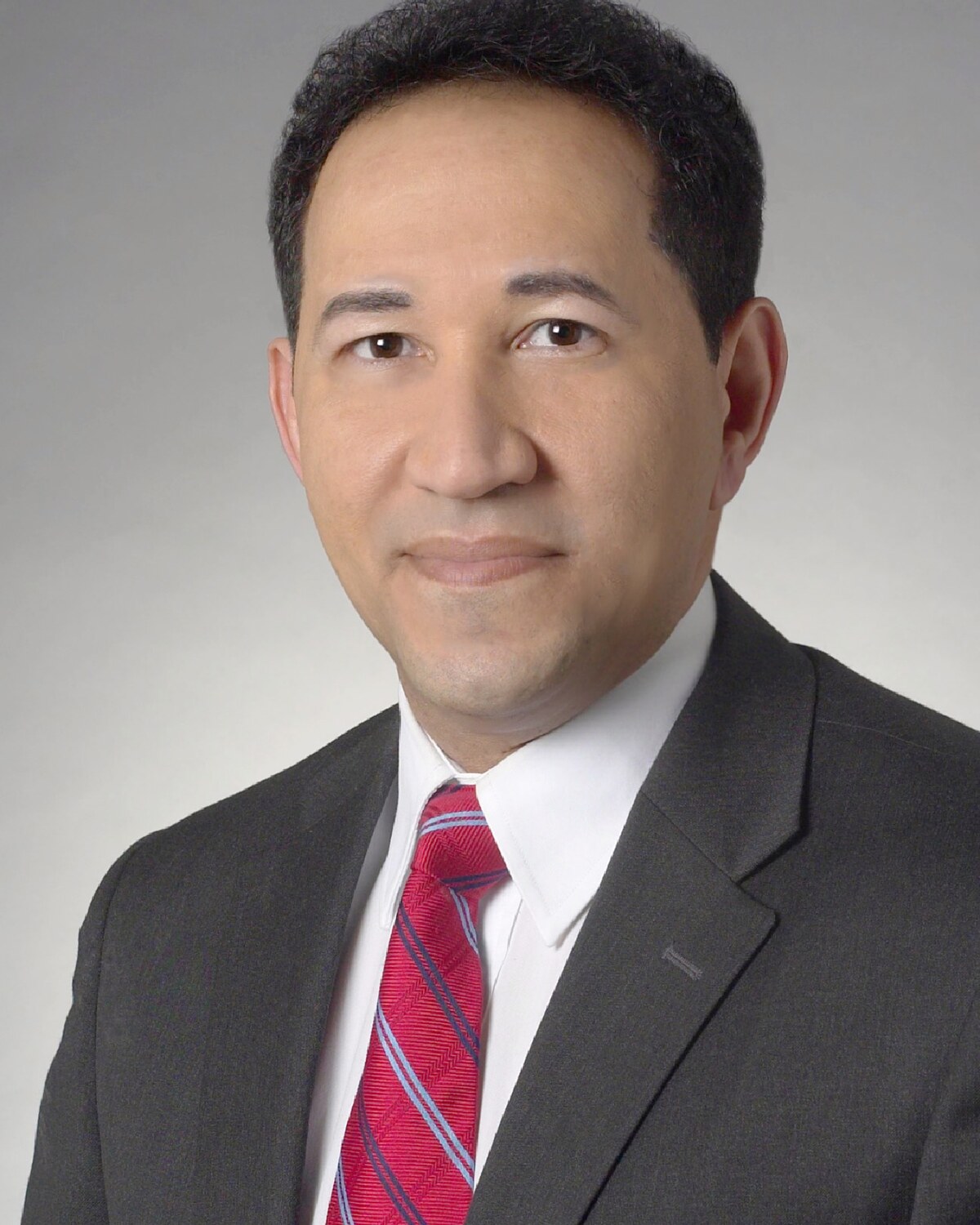 Official portrait of Carlos González, Massachusetts State Representative for the 10th Hampden District.