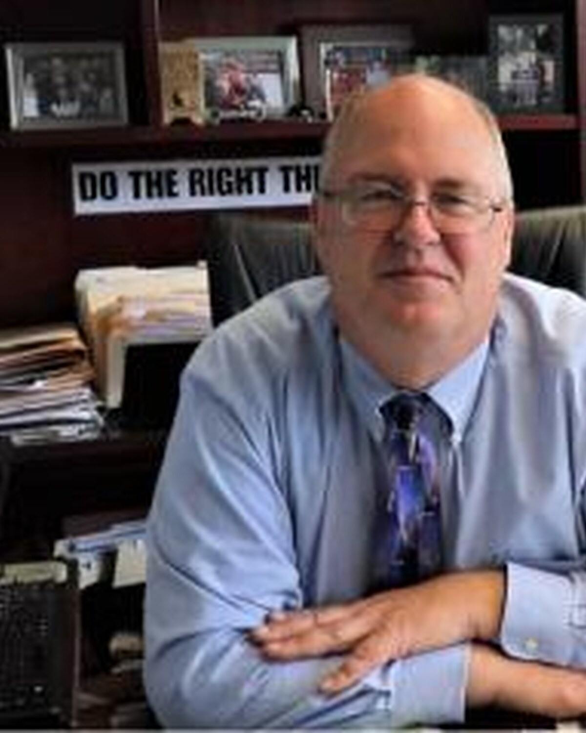 Official portrait of David E. "Dave" Sullivan, District Attorney for the Northwestern District.