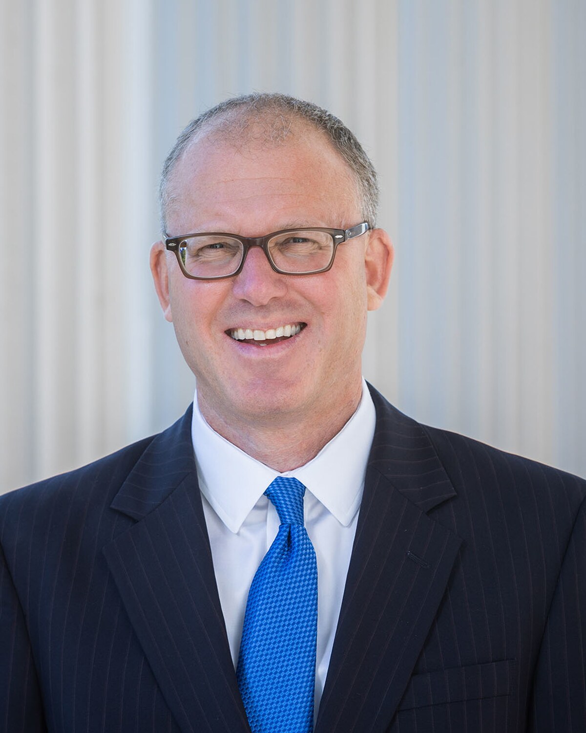 Official portrait of Jason M. Lewis, Massachusetts State Senator for the Fifth Middlesex District.
