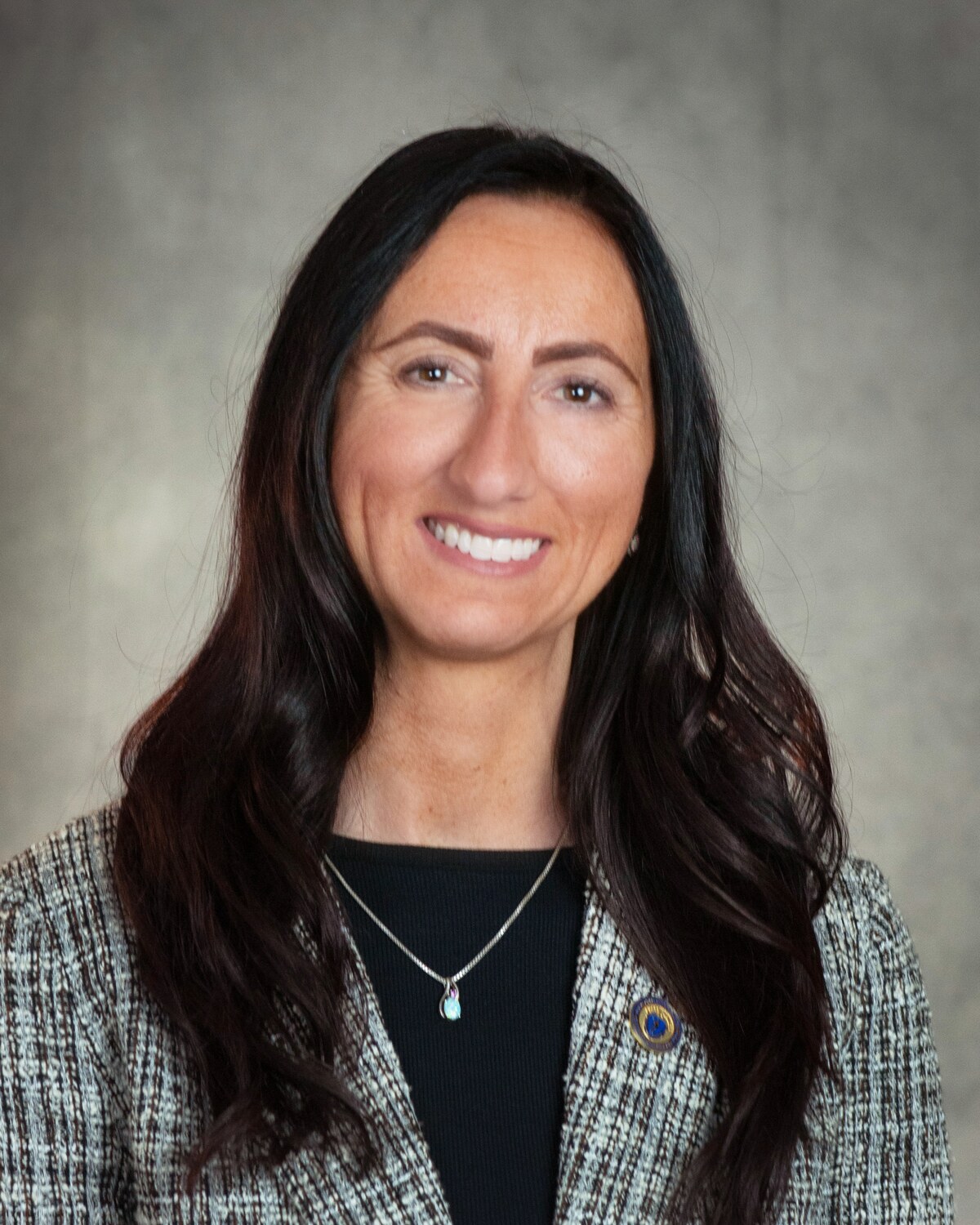 Official portrait of Kelly A. Dooner, Massachusetts State Senator for the Third Bristol and Plymouth District.