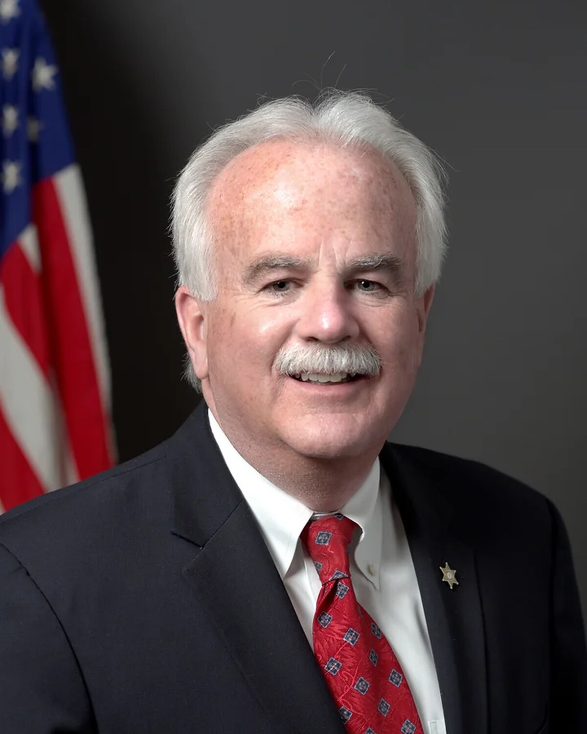Official portrait of Kevin F. Coppinger, Essex County Sheriff.