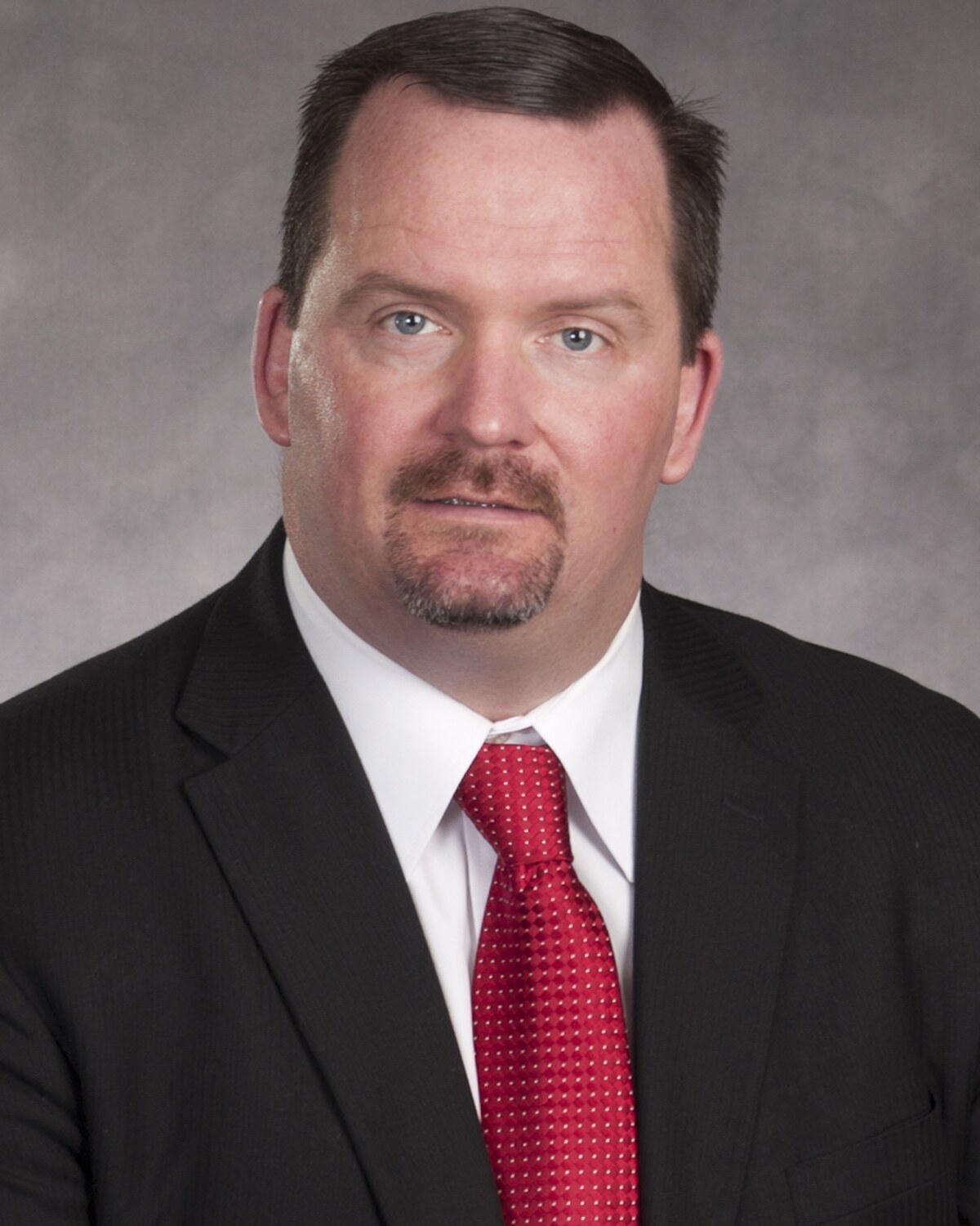 Official portrait of Michael J. Moran, Massachusetts State Representative for the 18th Suffolk District.