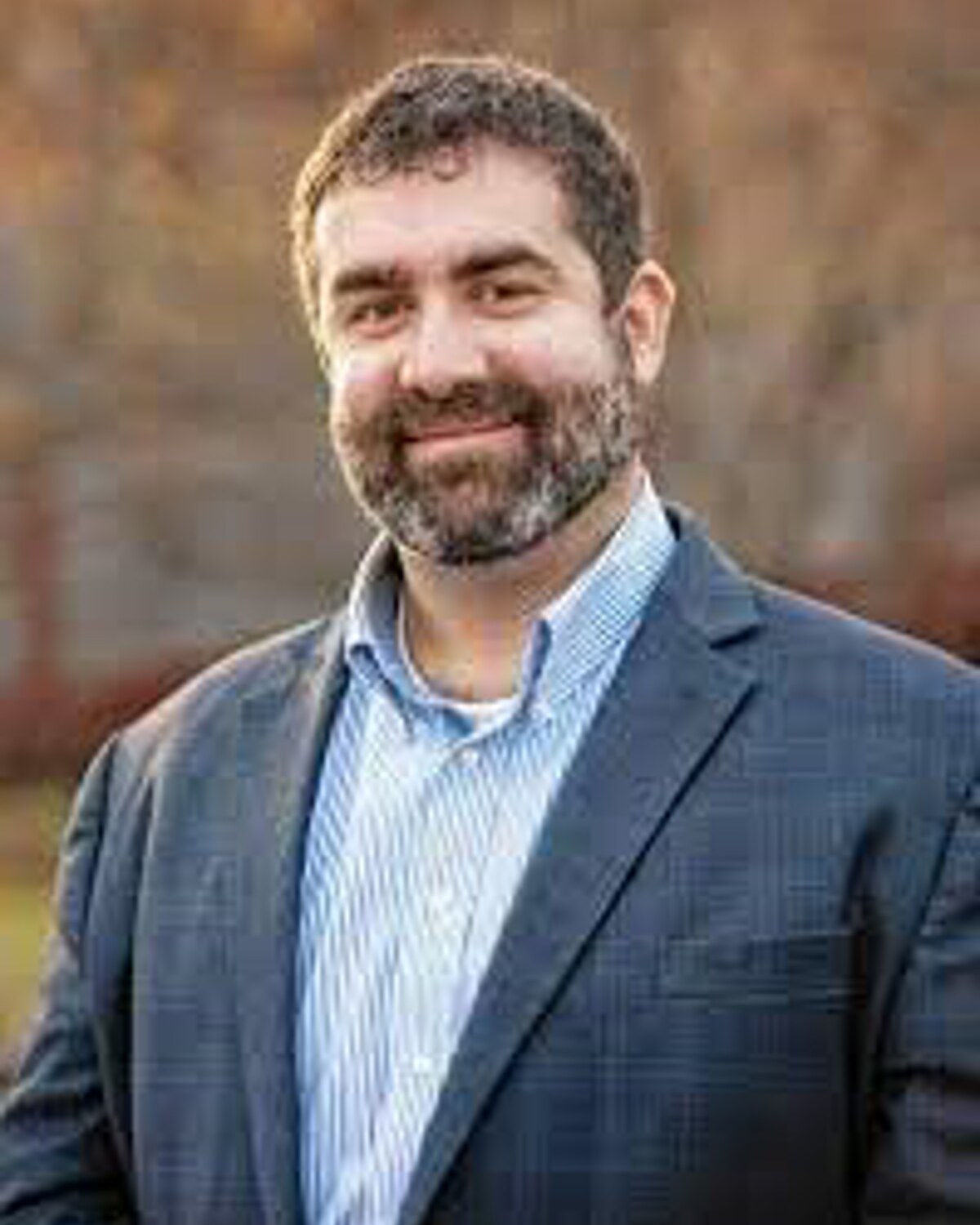 Official portrait of Paul W. Mark, Massachusetts State Senator for the Berkshire, Hampden, Franklin and Hampshire District.