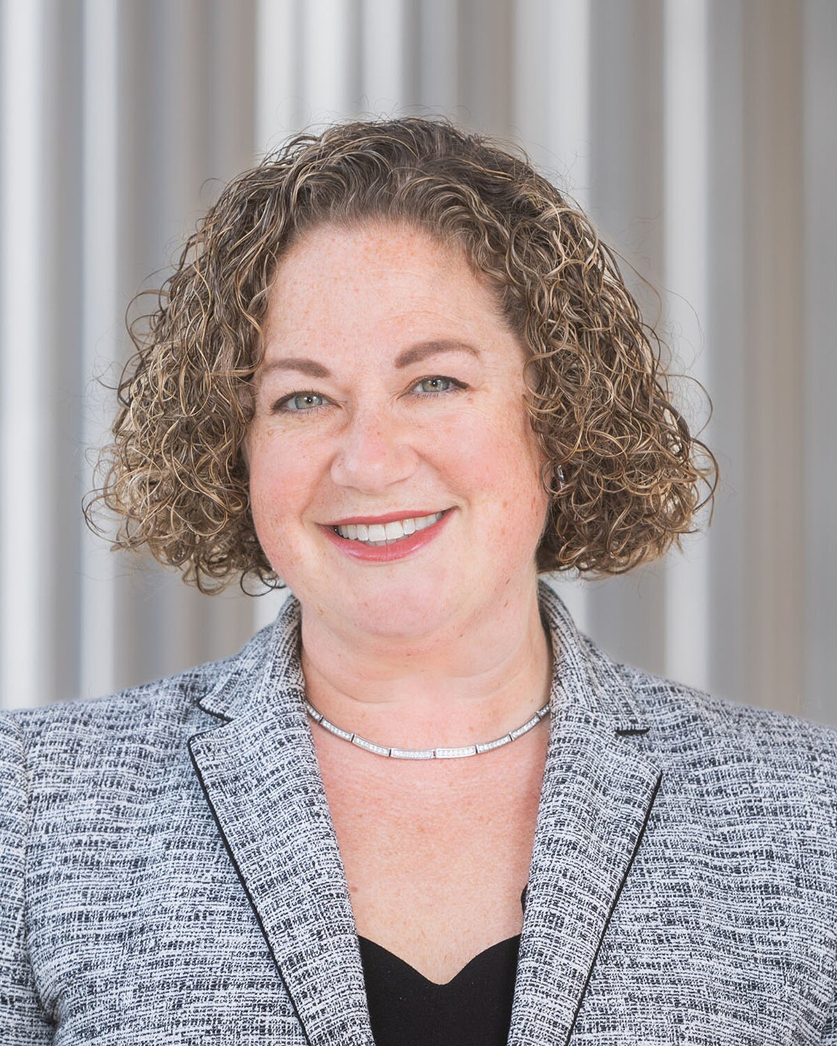 Official portrait of Rebecca L. "Becca" Rausch, Massachusetts State Senator for the Norfolk, Worcester and Middlesex District.