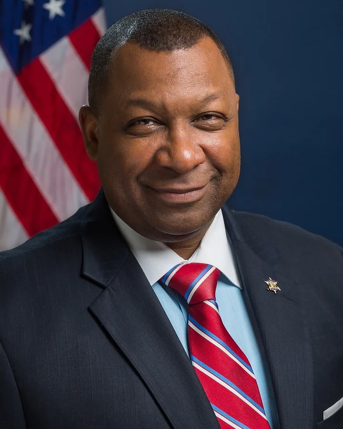 Official portrait of Steven W. "Steve" Tompkins, Suffolk County Sheriff.