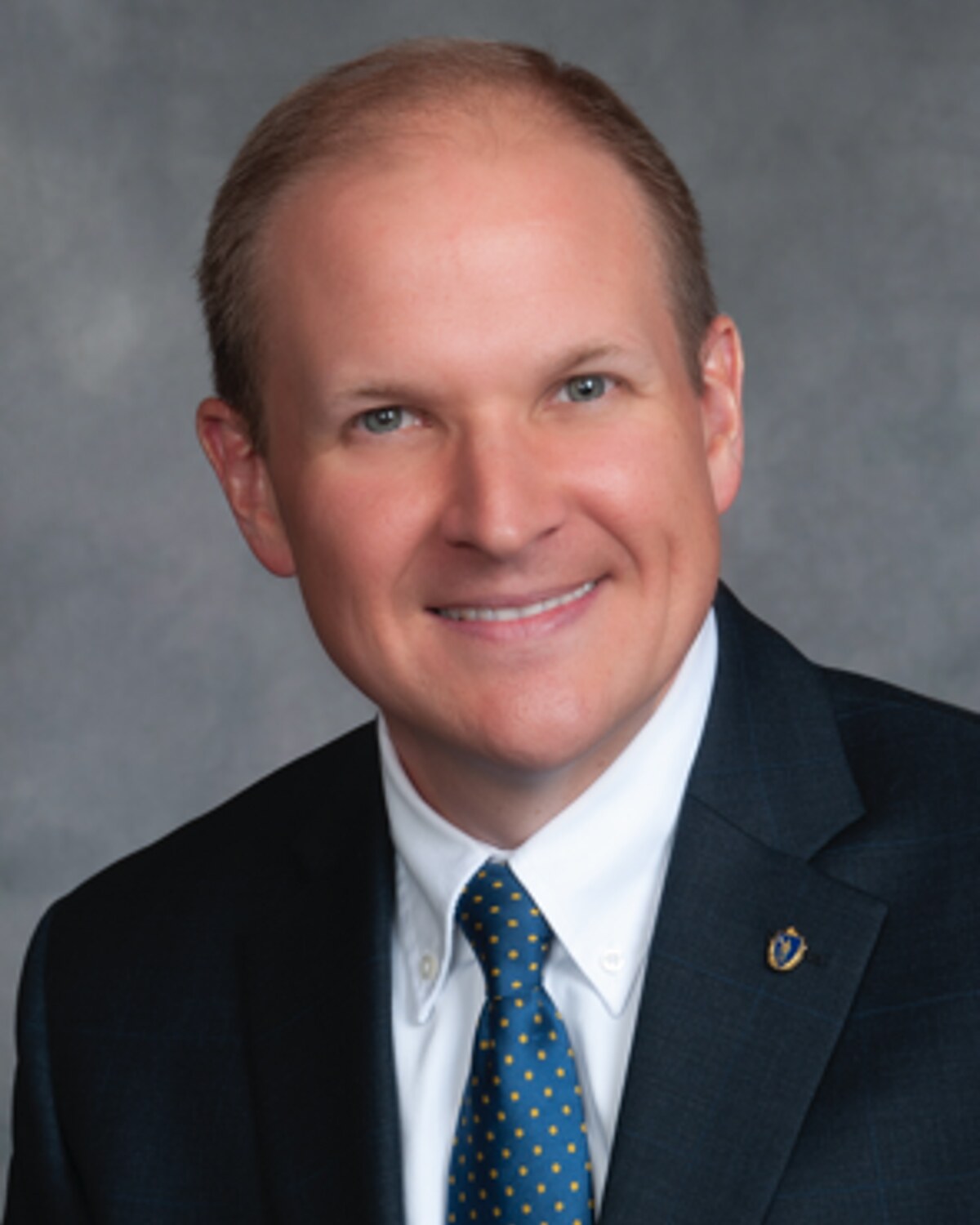 Official portrait of Todd M. Smola, Massachusetts State Representative for the 1st Hampden District.