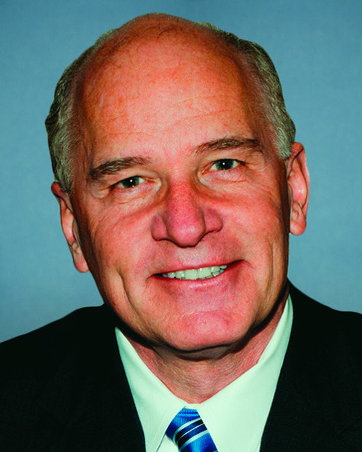 Official portrait of William Richard "Bill" Keating, United States Representative for Massachusetts's 9th Congressional District.